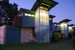 a house with lights on the front of it at Crescent Head Spa Villa in Crescent Head