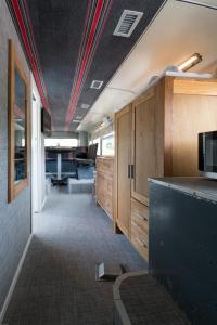 A television and/or entertainment centre at Bed In Bus