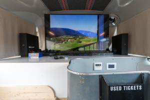 A television and/or entertainment centre at Bed In Bus