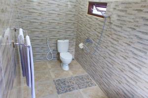 Ванна кімната в CR Tris Rooms Seminyak