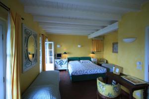 A bed or beds in a room at Agriturismo Natta Di Monte Tabor