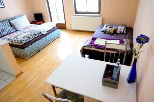 Postel nebo postele na pokoji v ubytování Apartmany Jachymov