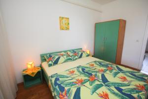 Postel nebo postele na pokoji v ubytování Apartments Plavica