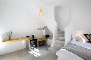 Postel nebo postele na pokoji v ubytování Dreambox Mykonos Suites