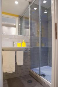 a bathroom with a shower and a sink at Secret Rhome Loft in Rome