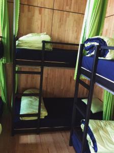 Postel nebo postele na pokoji v ubytování Homestay Hoang Vy
