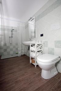 Kylpyhuone majoituspaikassa Ospitidelpero