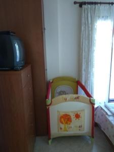 Postel nebo postele na pokoji v ubytování Ioannis Stagkonis Apartment