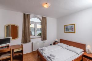 Posteľ alebo postele v izbe v ubytovaní Boutique Hotel B&B Villa Paula + 37 fotografií