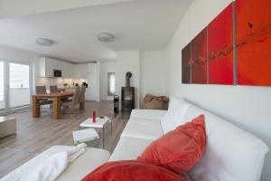Posezení v ubytování Ferienhaus Vermeer