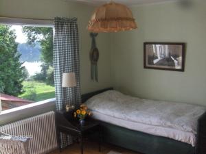 Postel nebo postele na pokoji v ubytování Mälby Säteri B&B