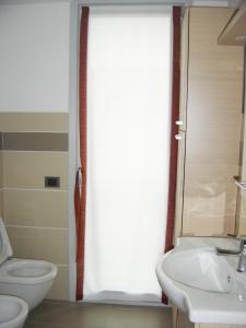 Kúpeľňa v ubytovaní La trifula bianca apts.