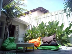 a group of pillows sitting on a patio at The Patio Yogya in Yogyakarta