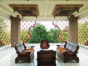 A seating area at Java Village Resort by HOMEE Yogyakarta