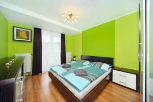 Postel nebo postele na pokoji v ubytování Apartment 91/65 Špindlerův Mlýn