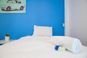 Cama ou camas em um quarto em Varinda Hostel