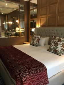 Voodi või voodid majutusasutuse Hotel Rector toas