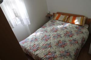 Posteľ alebo postele v izbe v ubytovaní Apartman Lucin