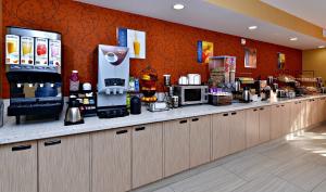 a kitchen filled with lots of counter top space at Best Western Plus Fresno Airport Hotel in Fresno