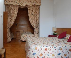 Postel nebo postele na pokoji v ubytování Hotel Albergo Dolomiti