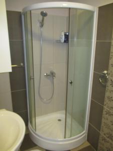 A bathroom at Genex Apartment Még 37 kép