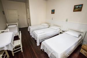 Postel nebo postele na pokoji v ubytování Hotel Pousada XV