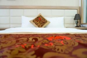 Ruby Hotelにあるベッド