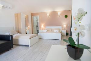 Un pat sau paturi într-o cameră la Belvedere Rent Rooms