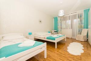 Postel nebo postele na pokoji v ubytování Apartment Lorenzo