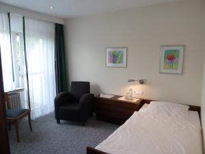 Postel nebo postele na pokoji v ubytování Landhotel Ridder