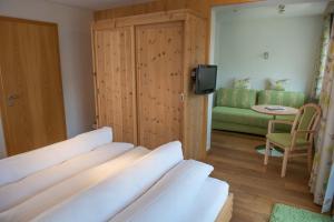 Postel nebo postele na pokoji v ubytování Hotel Hertehof