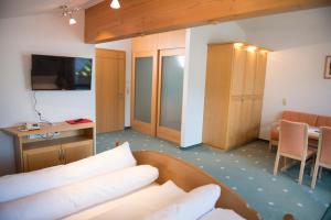 Postel nebo postele na pokoji v ubytování Hotel Hertehof