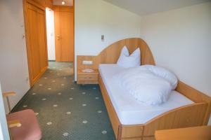 Postel nebo postele na pokoji v ubytování Hotel Hertehof