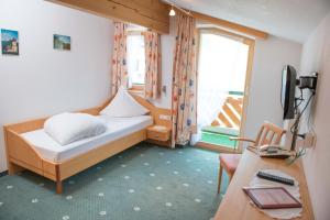 Postel nebo postele na pokoji v ubytování Hotel Hertehof