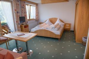 Postel nebo postele na pokoji v ubytování Hotel Hertehof