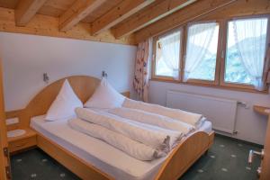 Postel nebo postele na pokoji v ubytování Hotel Hertehof