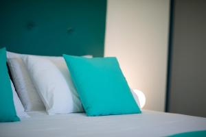 Posteľ alebo postele v izbe v ubytovaní Acqua Vatos Paros Hotel