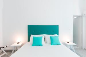 Posteľ alebo postele v izbe v ubytovaní Acqua Vatos Paros Hotel