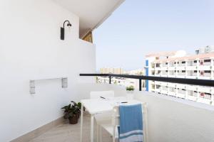 A balcony or terrace at Los Cristianos to enjoy, relax and live the ocean!