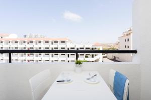 A balcony or terrace at Los Cristianos to enjoy, relax and live the ocean!