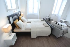 Posteľ alebo postele v izbe v ubytovaní Pearl Apartment in the Center with City View + 11 fotografií