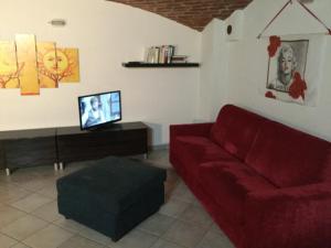 TV tai viihdekeskus majoituspaikassa Appartamento Anais