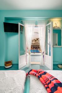 Voodi või voodid majutusasutuse Ios Resort toas