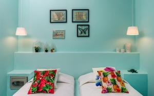 Voodi või voodid majutusasutuse Ios Resort toas