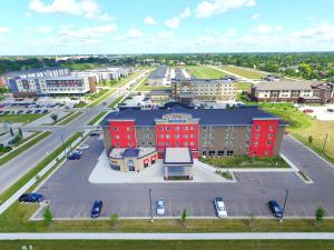 an aerial view of a city with red buildings at Baymont by Wyndham Grand Forks in Grand Forks