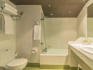 Koupelna v ubytování Sport Hotel