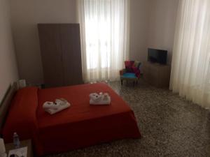 Postel nebo postele na pokoji v ubytování B&B Zia Iaia