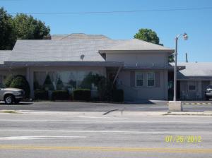 a house with a car parked in front of it at Clearview Motor Inn in Hanover