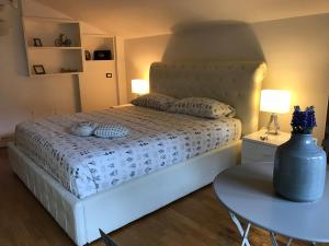 Posteľ alebo postele v izbe v ubytovaní Princess B&B Frascati