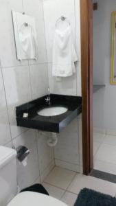 Et badeværelse på Suites do Ratinho